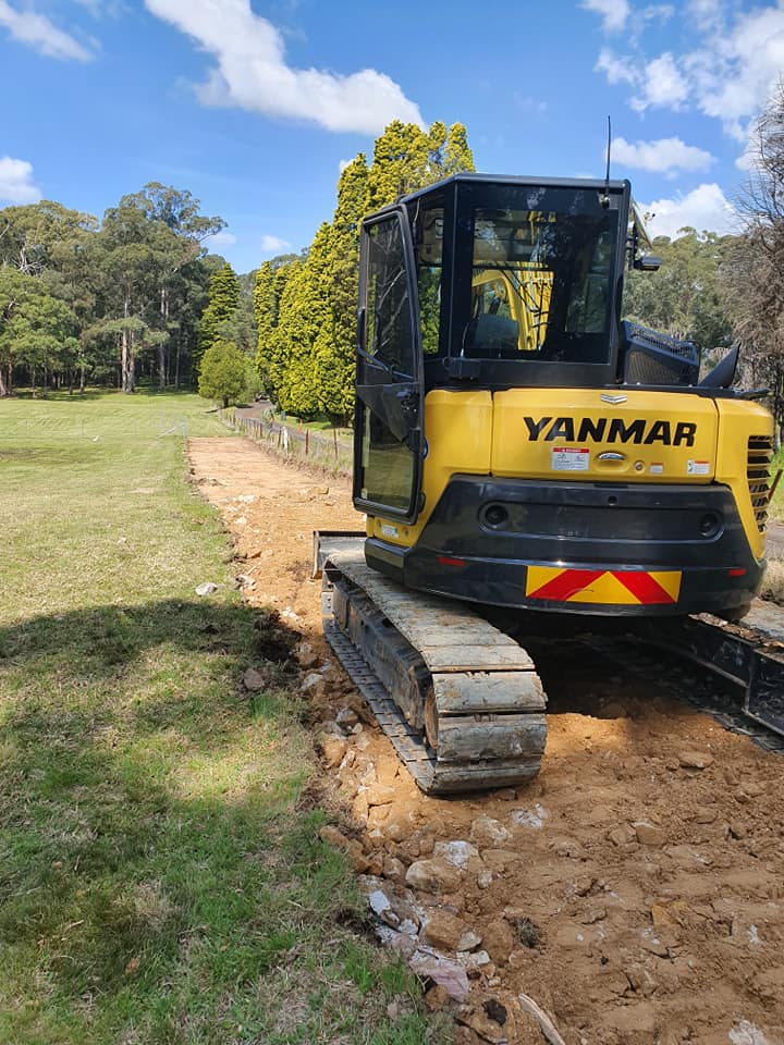 land excavation and fill on farmland with a yanmar