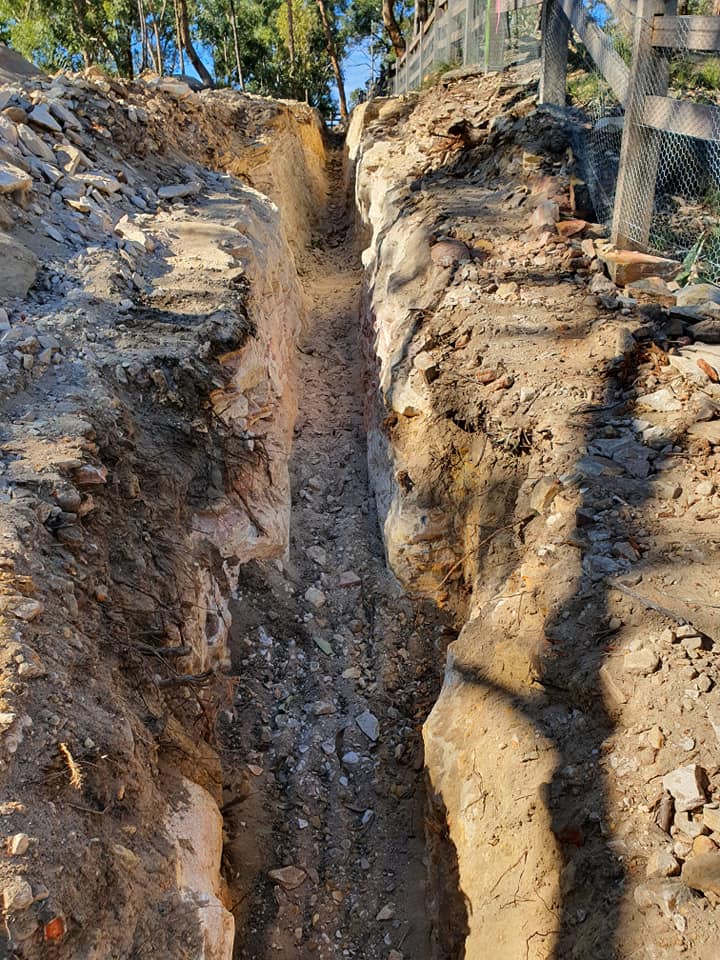 trench digging and pipe installation