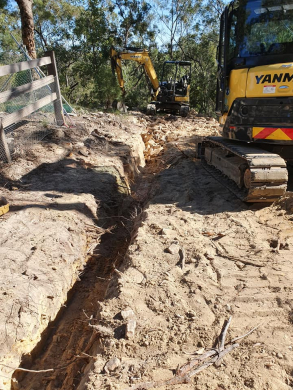 trench digging and pipe installation
